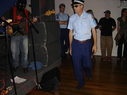 Police arrive at Black Assassins gig